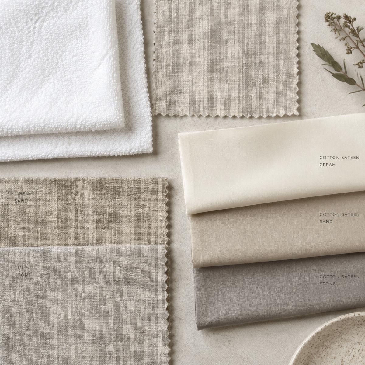 Fabric swatches in cream, sand and stone
